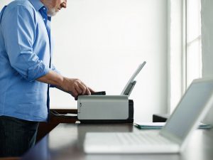 man using printer